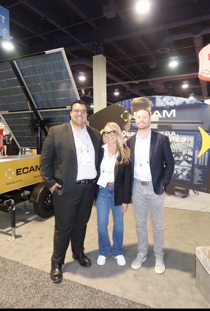 Modern Client at an industry summit, 2025, on the floor with attendees.